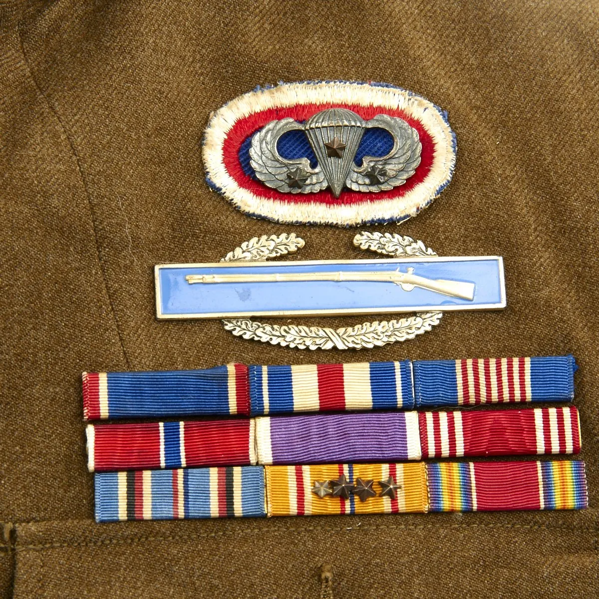 Original U.S. WWII 11th Airborne DSC - MacArthur Honor Guard- Los Banos Liberator Grouping